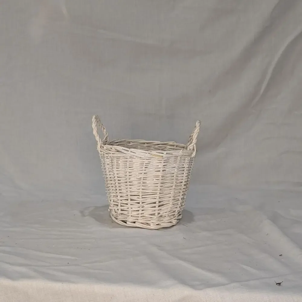 White wicker basket with handles